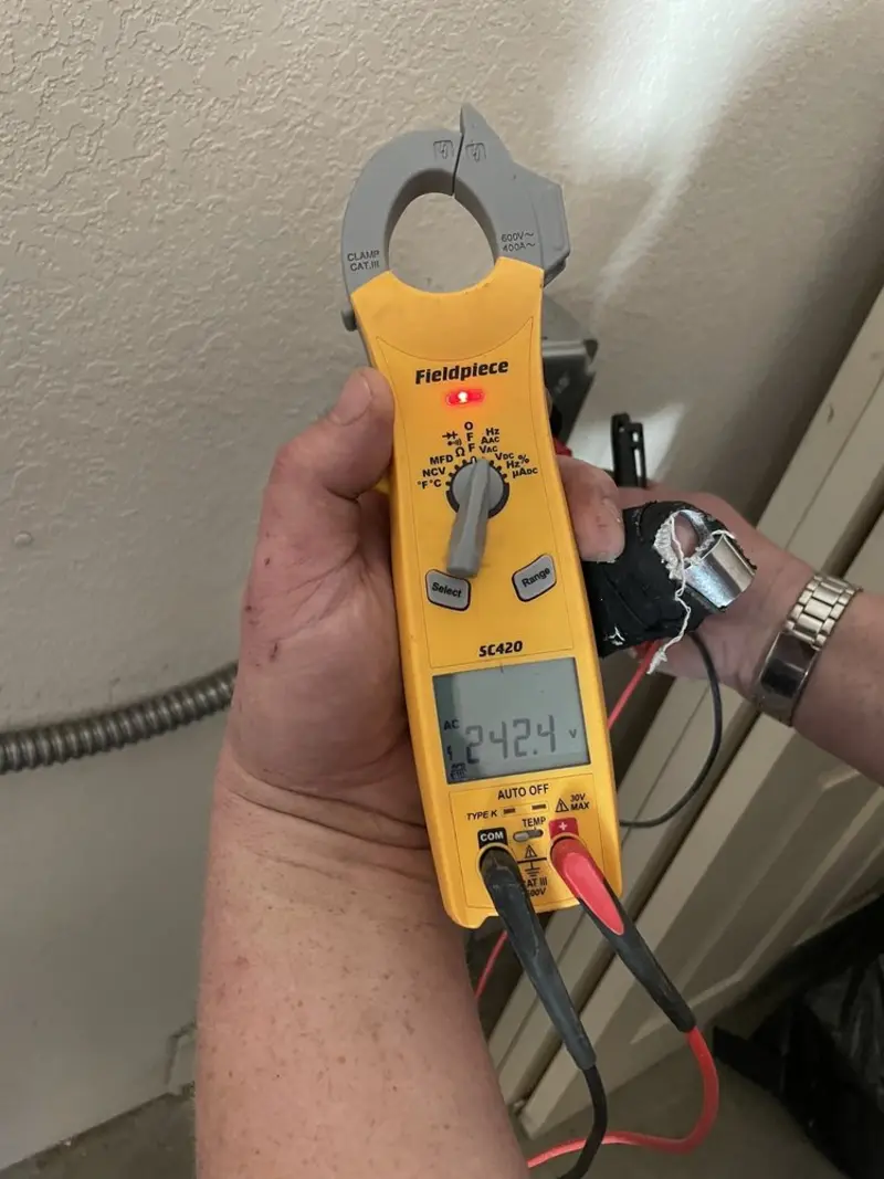 Voltage testing with clamp meter during Hot Tub / Pool Electrical Wiring in Downers Grove